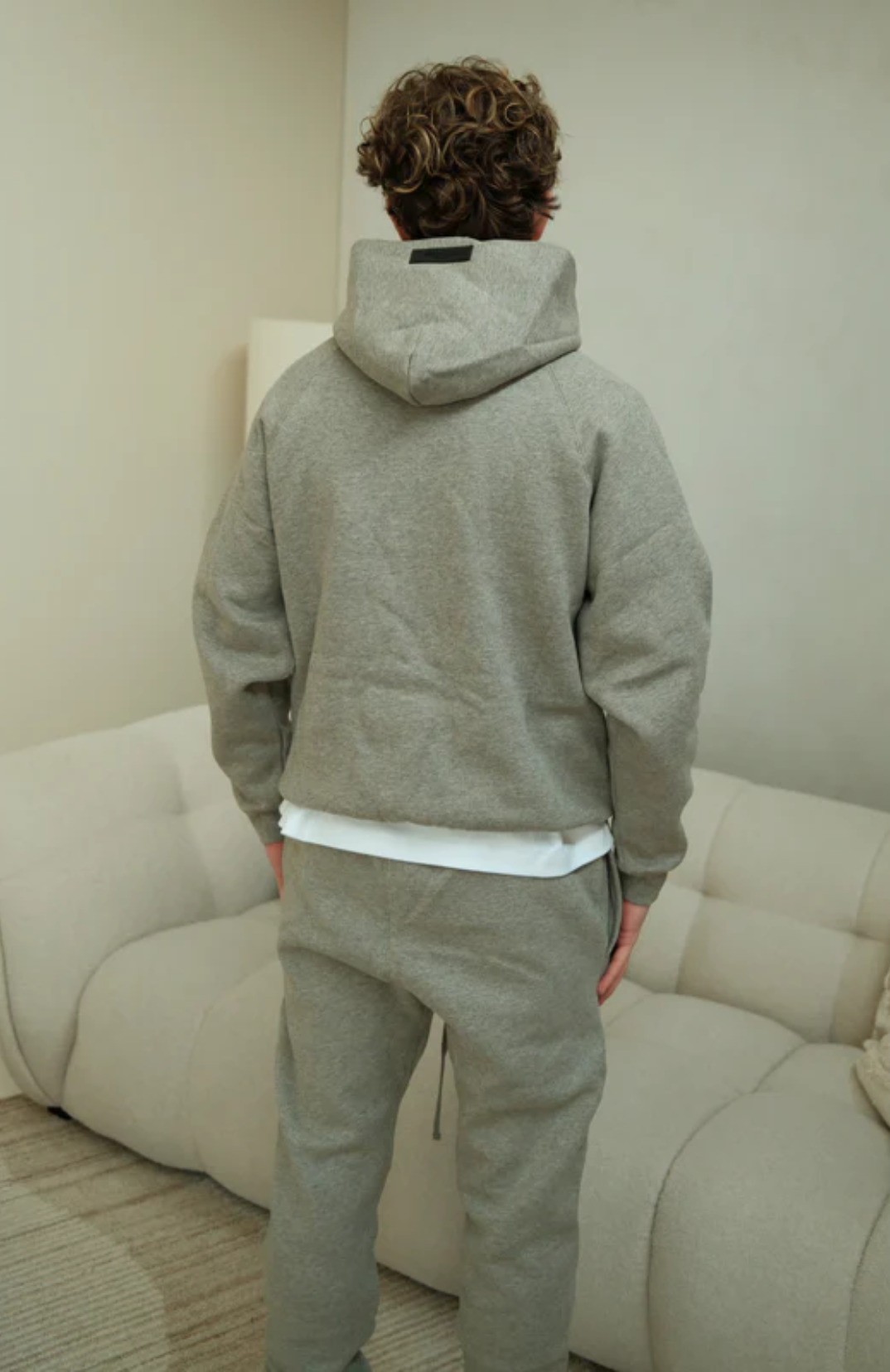 Fear of God ESSENTIALS 1977 hoodie and sweatpants set in dark oatmeal back view