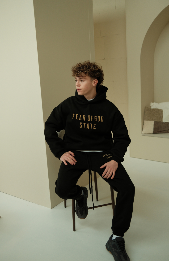 Fear of God ESSENTIALS hoodie and sweatpants set in black