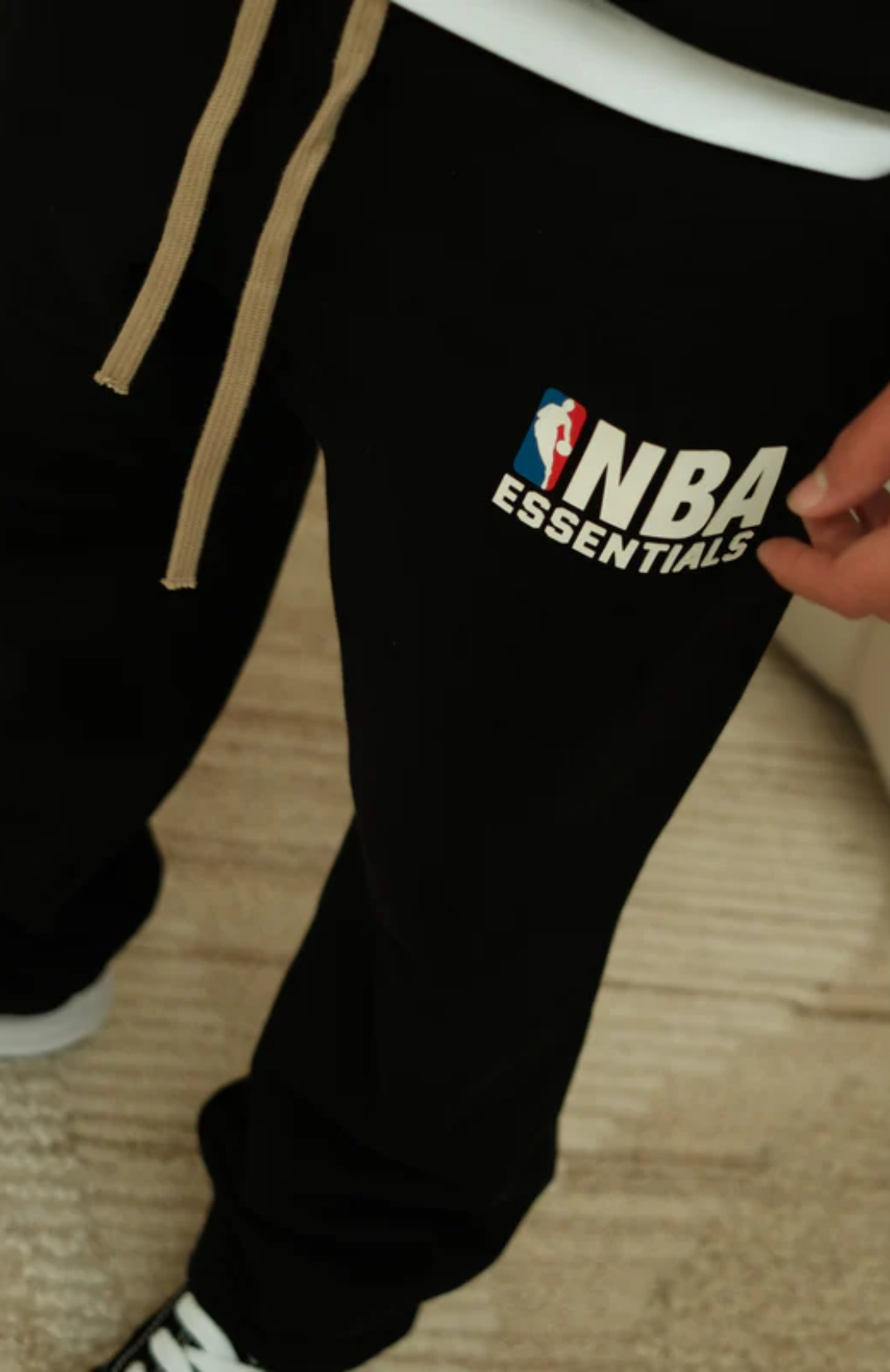 Fear Of God Essentials NBA sweatpants in black frontview
