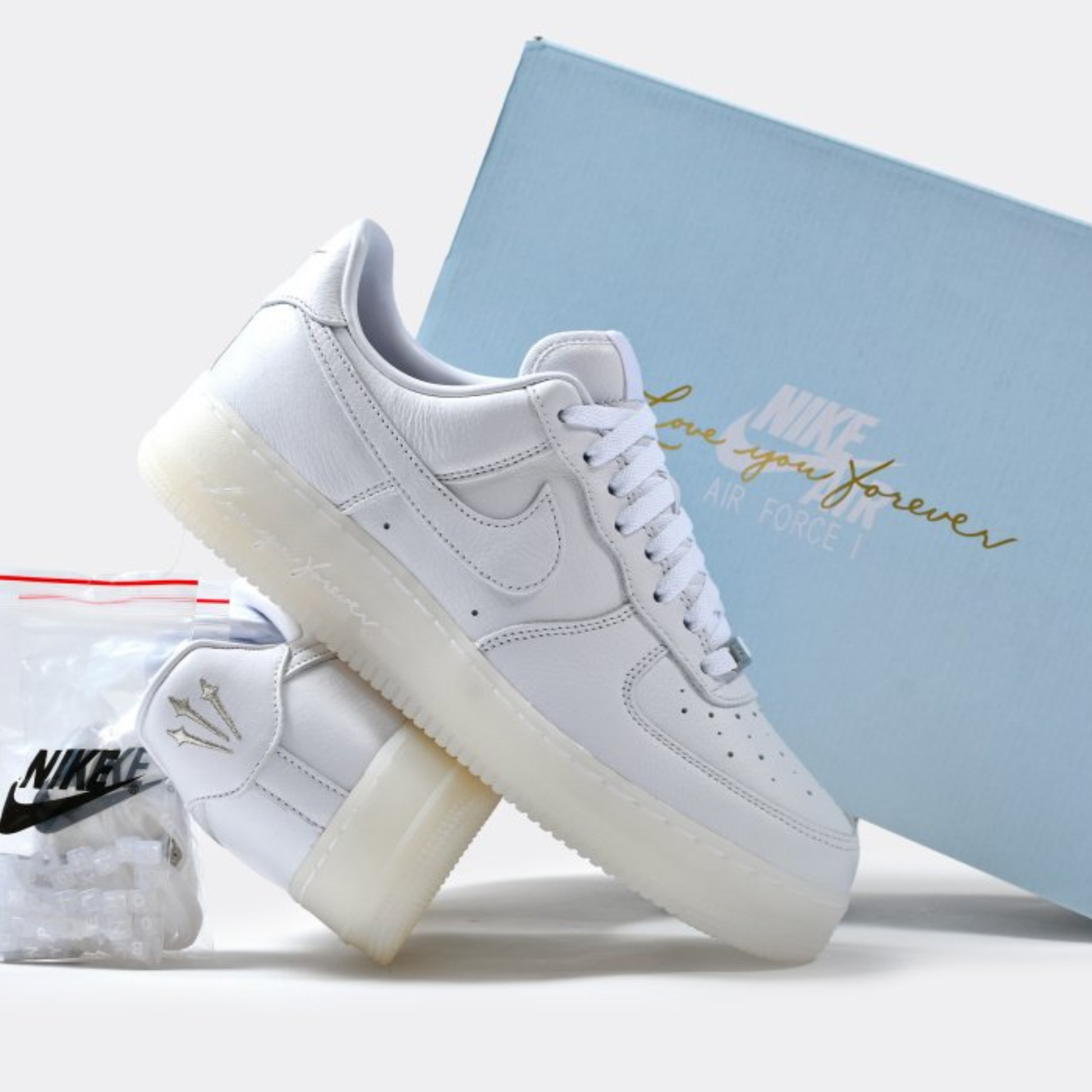 Nike Air Force 1 Low Drake NOCTA Certified Lover Boy sneaker in white cobalt tint with box alternate view